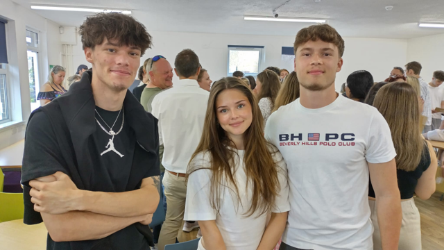 students celebrating exam results